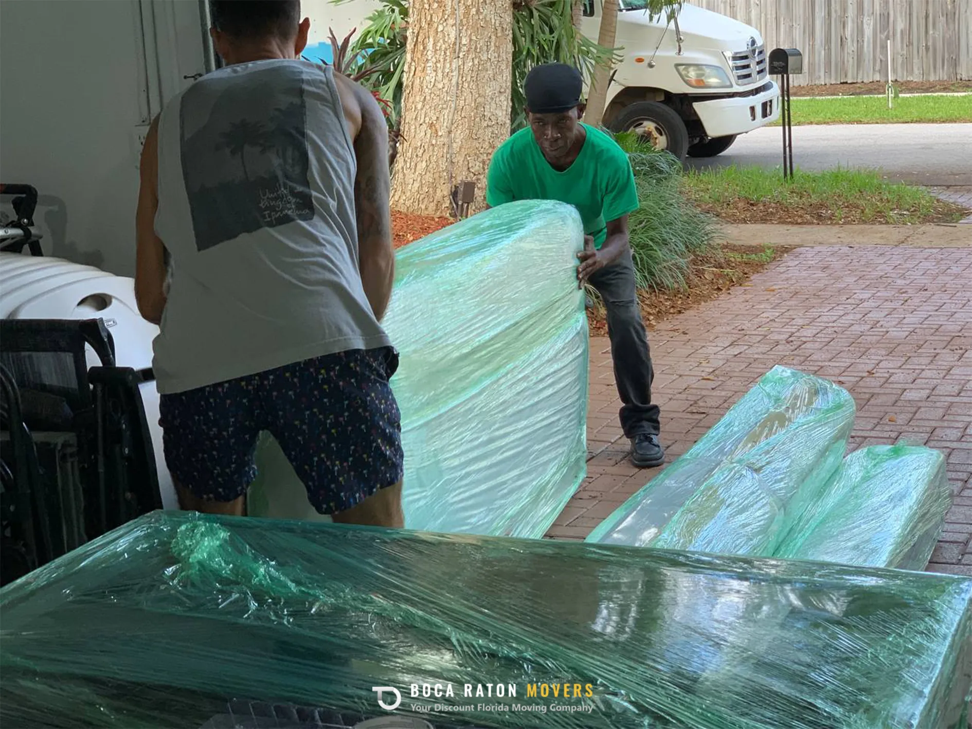 Boca Raton Movers Team Members Loading Packed Furniture
