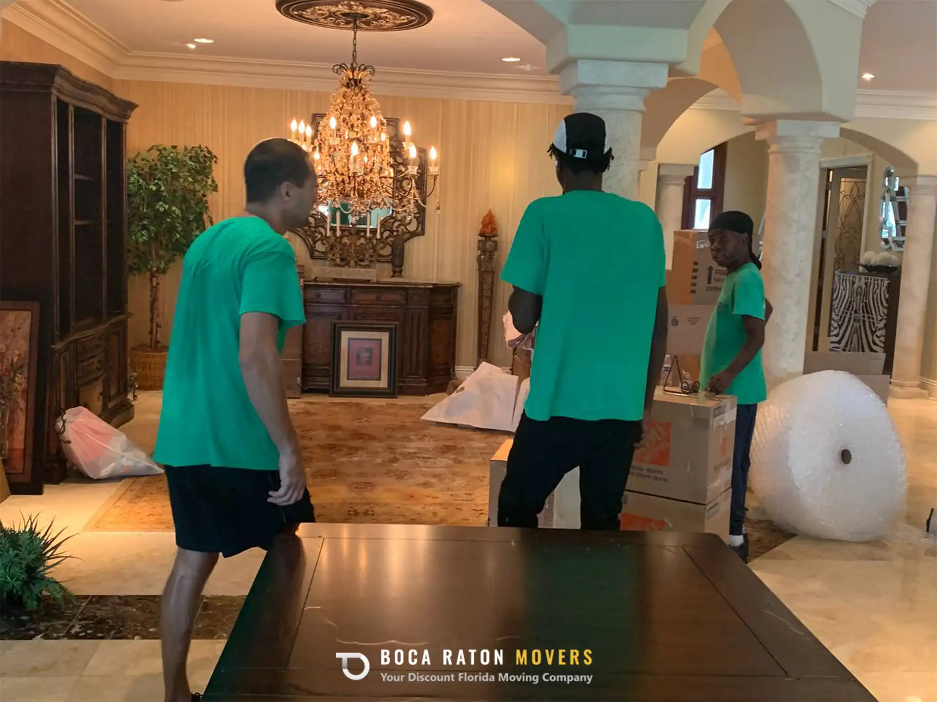 Boca Raton Movers Team Members Packing Service Boxes and Furniture